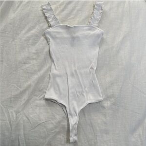 Alya White Ribbed Ruffle Bodysuit